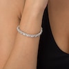 Thumbnail Image 1 of Previously Owned - 1/2 CT. T.W. Composite Diamond "XO" Bracelet in Sterling Silver - 7.25"