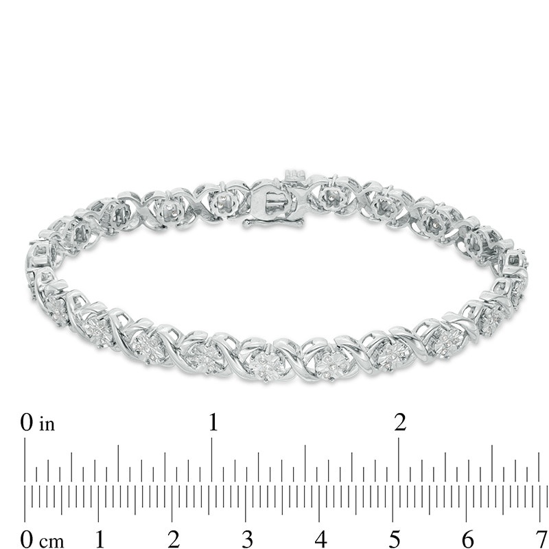 Previously Owned - 1/2 CT. T.W. Composite Diamond "XO" Bracelet in Sterling Silver - 7.25"