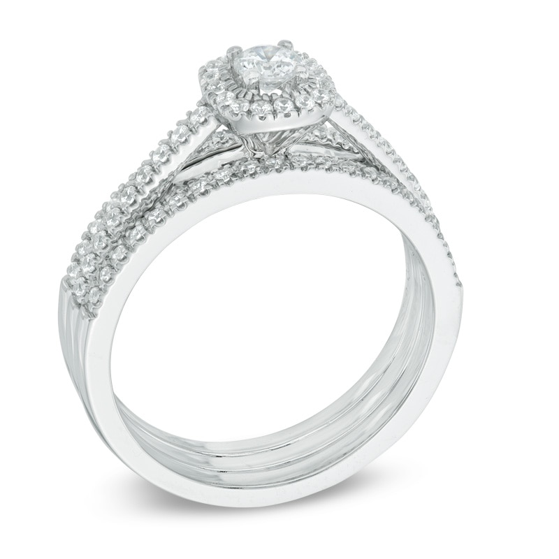 Previously Owned - 1/2 CT. T.W. Diamond Frame Three Piece Bridal Set in 14K White Gold