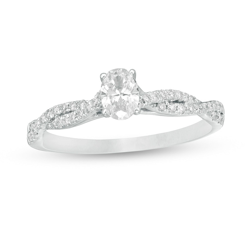 Main Image 1 of Previously Owned - 1/2 CT. T.W. Oval Diamond Twist Engagement Ring in 14K White Gold