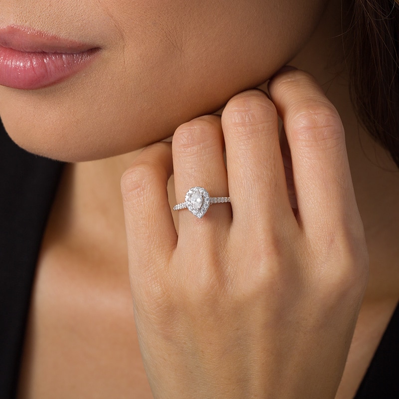 Main Image 2 of Previously Owned - 1/2 CT. T.W. Pear-Shaped Diamond Frame Engagement Ring in 14K White Gold