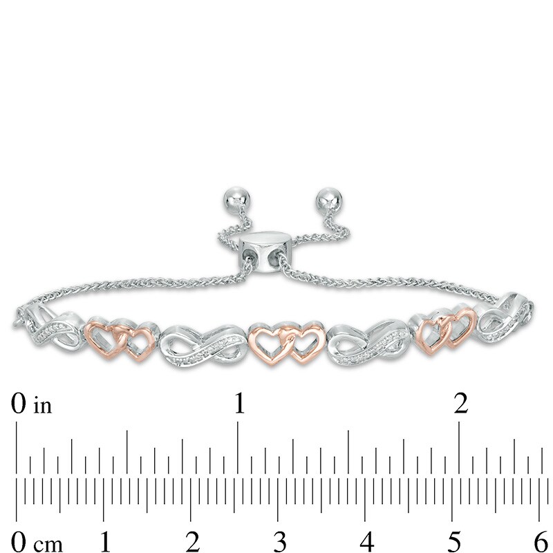 Main Image 2 of Previously Owned - 1/20 CT. T.W. Diamond Heart Infinity Bolo Bracelet in Sterling Silver and 10K Rose Gold - 9.5"