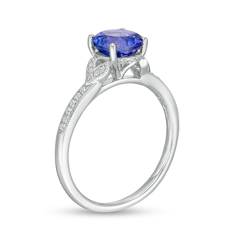 Previously Owned - 7.0mm Tanzanite and 1/10 CT. T.W. Diamond Vintage-Style Engagement Ring in 14K White Gold