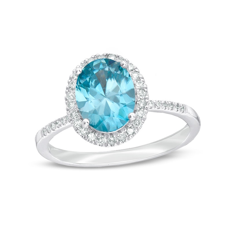 Main Image 1 of Previously Owned - Oval Blue Zircon and 1/4 CT. T.W. Diamond Frame Engagement Ring in 14K White Gold