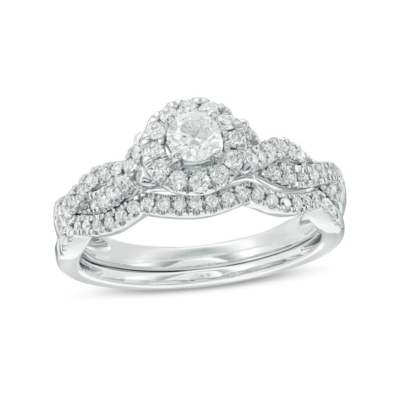 Main Image 1 of Previously Owned - 1/2 CT. T.W. Diamond Frame Twist Bridal Set in 10K White Gold