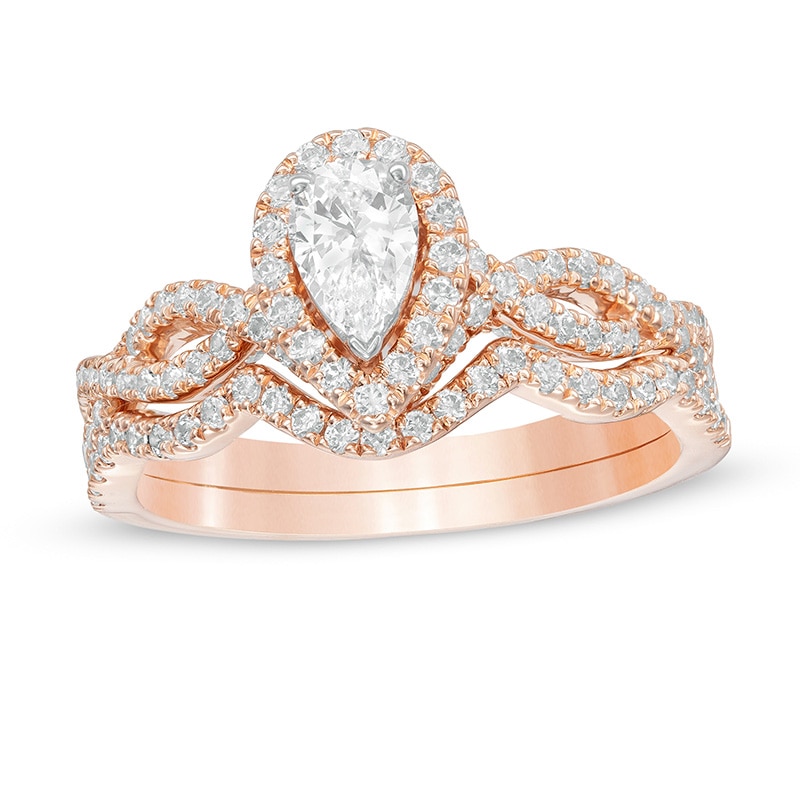 Main Image 1 of Previously Owned - 1 CT. T.W. Pear-Shaped Diamond Frame Twist Split Shank Bridal Set in 14K Rose Gold