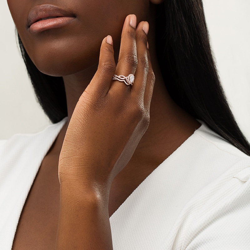 Main Image 2 of Previously Owned - 1 CT. T.W. Pear-Shaped Diamond Frame Twist Split Shank Bridal Set in 14K Rose Gold
