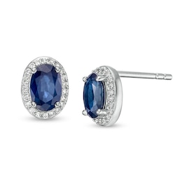 Previously Owned - Oval Blue Sapphire and 1/10 CT. T.W. Diamond Frame Stud Earrings in 10K White Gold