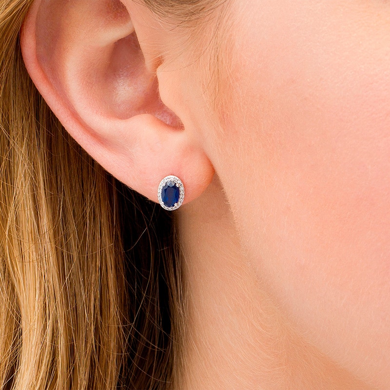 Main Image 2 of Previously Owned - Oval Blue Sapphire and 1/10 CT. T.W. Diamond Frame Stud Earrings in 10K White Gold