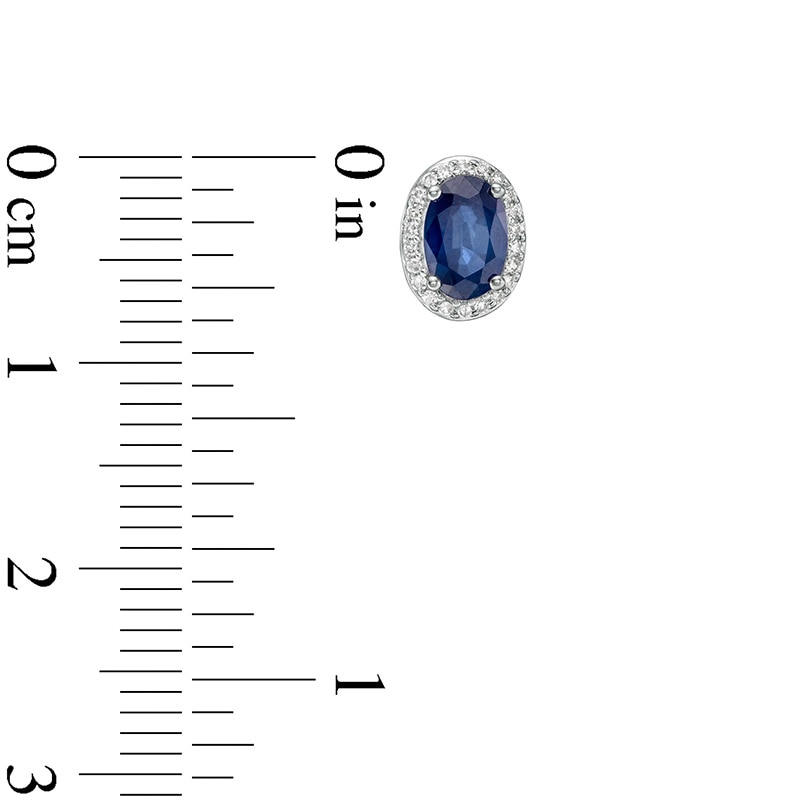 Main Image 3 of Previously Owned - Oval Blue Sapphire and 1/10 CT. T.W. Diamond Frame Stud Earrings in 10K White Gold