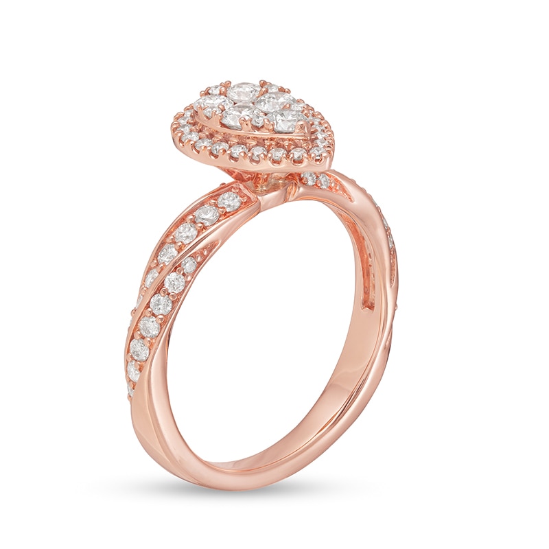 Previously Owned - 1 CT. T.W. Composite Pear Diamond Frame Twist Shank Engagement Ring in 14K Rose Gold