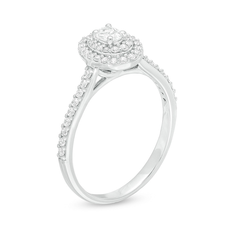 Previously Owned - 1/2 CT. T.W. Oval Diamond Double Frame Engagement Ring in 10K White Gold