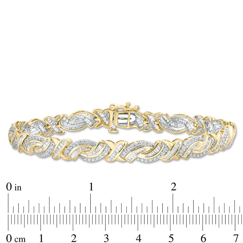 Previously Owned - 3 CT. T.W. Baguette and Round Diamond "X" Bypass Bracelet in 10K Gold - 7.5"