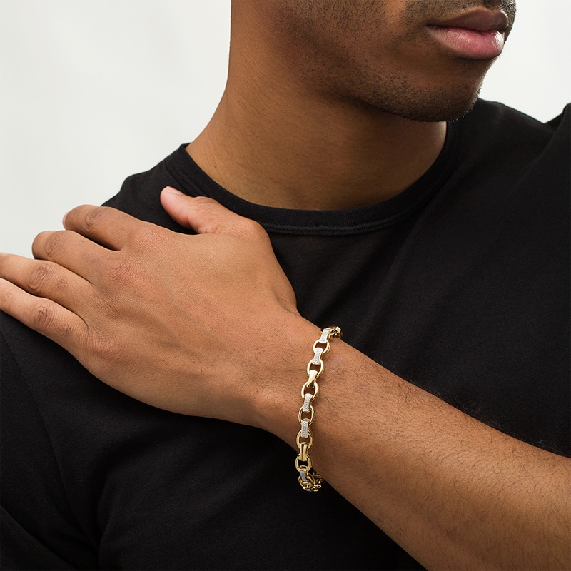 Previously Owned - Men's 1/3 CT. T.W. Diamond Open Oval and Bamboo Link Bracelet in 10K Gold - 8.5"
