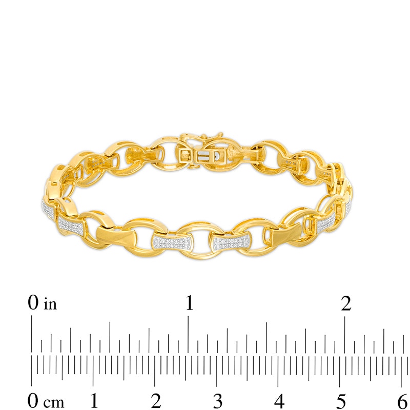 Previously Owned - Men's 1/3 CT. T.W. Diamond Open Oval and Bamboo Link Bracelet in 10K Gold - 8.5"