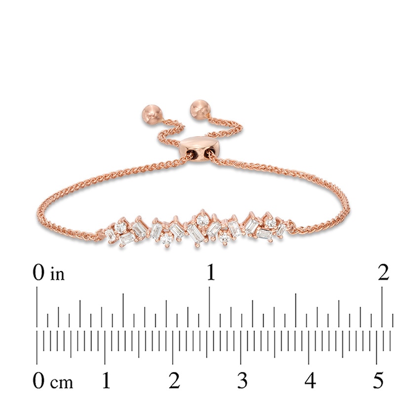 Previously Owned - 1/2 CT. T.W. Baguette and Round Diamond Scatter Bolo Bracelet in 10K Rose Gold - 9.5"