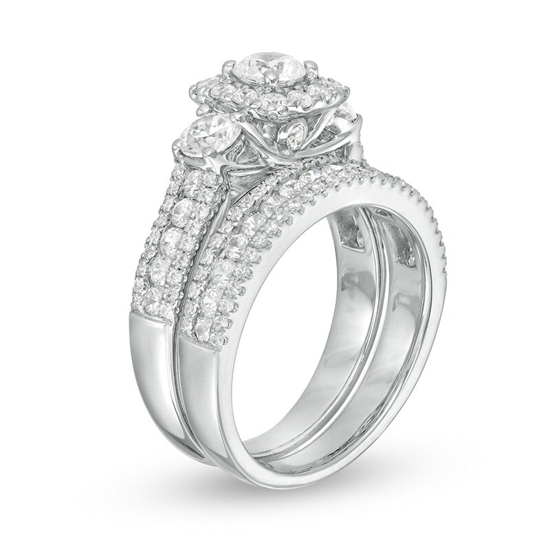 Previously Owned - 2 CT. T.W. Diamond Past Present Future® Cushion Frame Bridal Set in 14K White Gold