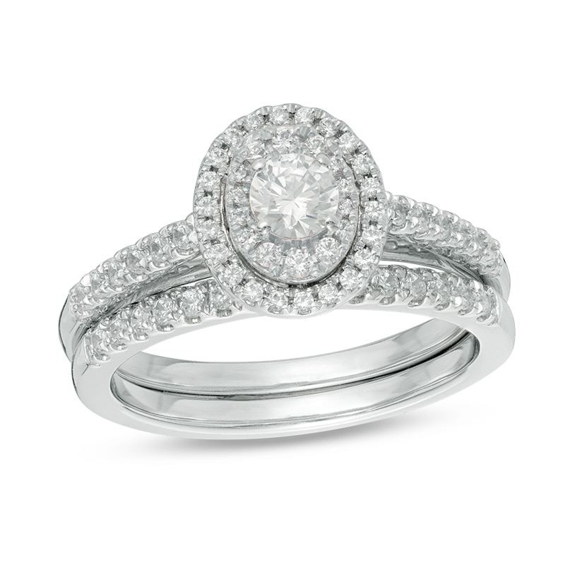 Main Image 1 of Previously Owned - 3/4 CT. T.W. Diamond Double Oval Frame Bridal Set in 14K White Gold