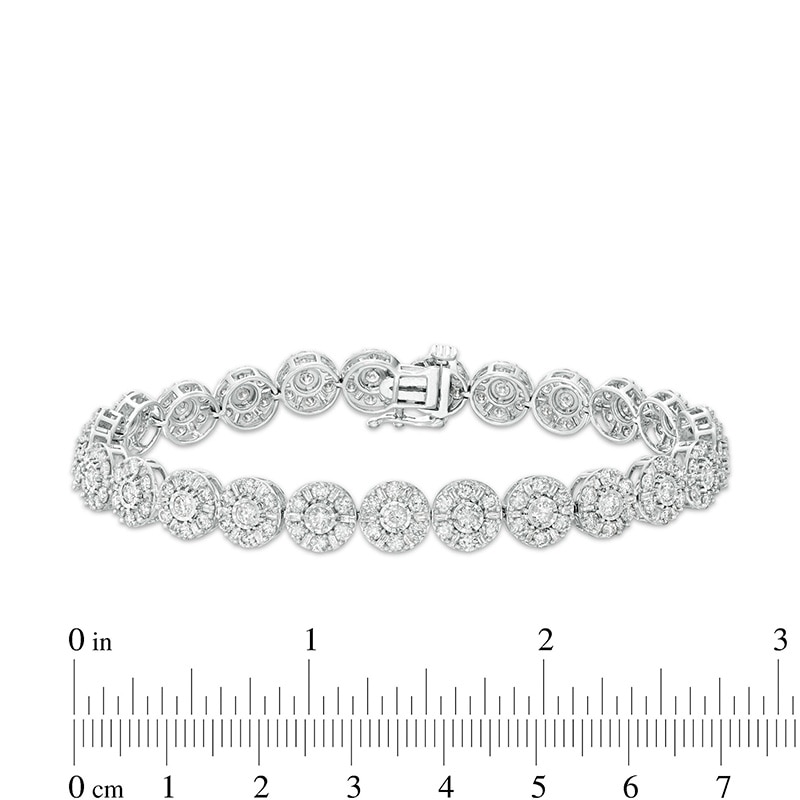 Previously Owned - 7 CT. T.W. Diamond Tennis Bracelet in 10K White Gold - 7.5"
