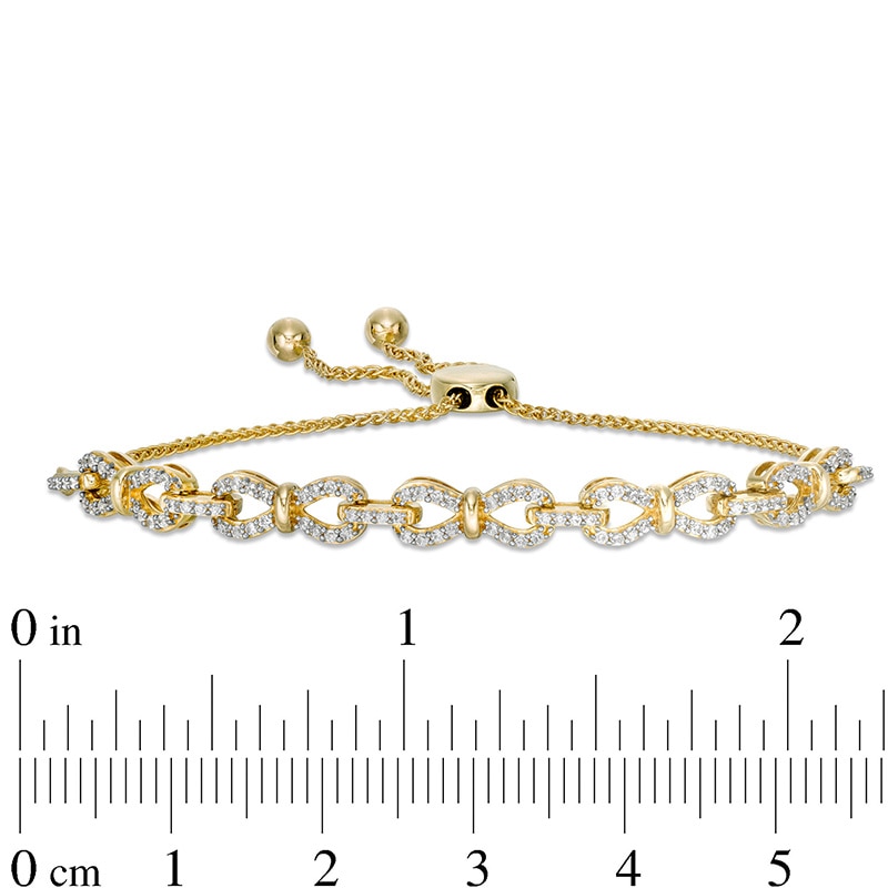 Main Image 2 of Previously Owned - 1/2 CT. T.W. Diamond Bow Link Bolo Bracelet in 10K Gold - 9.5"
