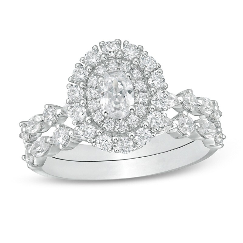 Previously Owned - 1-1/2 CT. T.W.  Oval Diamond Double Frame Bridal Set in 14K White Gold (I/SI2)