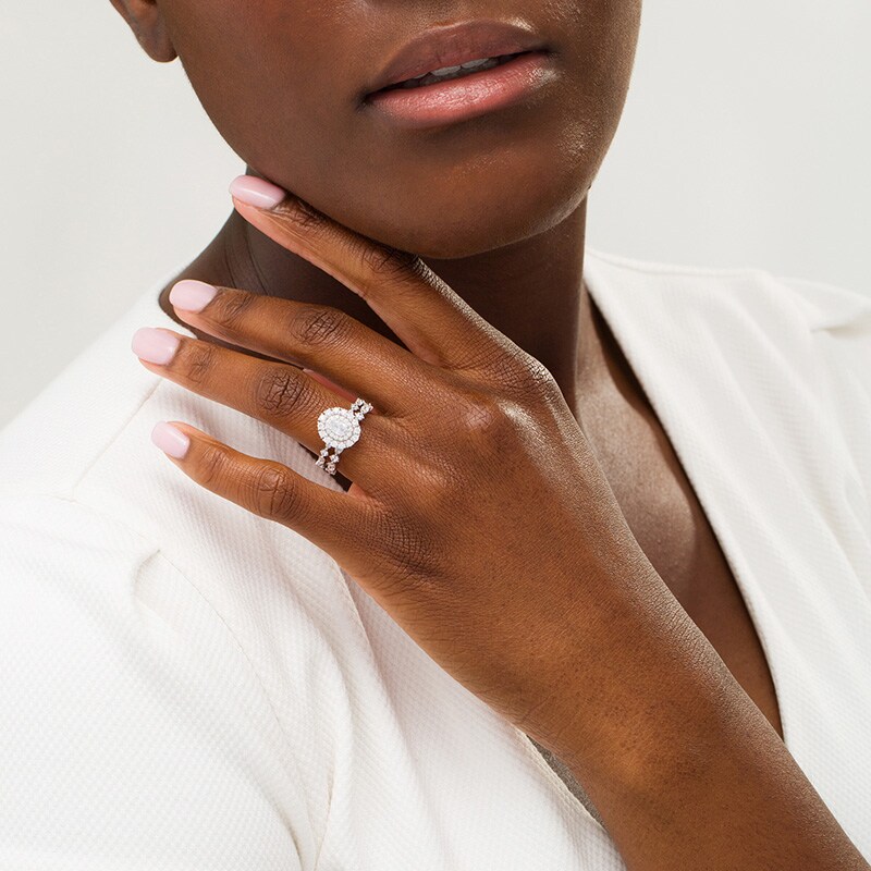 Previously Owned - 1-1/2 CT. T.W.  Oval Diamond Double Frame Bridal Set in 14K White Gold (I/SI2)
