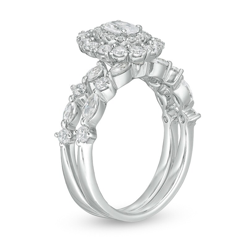 Previously Owned - 1-1/2 CT. T.W.  Oval Diamond Double Frame Bridal Set in 14K White Gold (I/SI2)