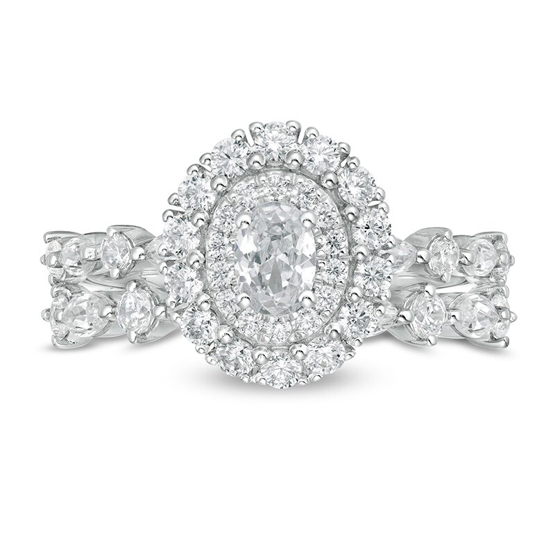 Previously Owned - 1-1/2 CT. T.W.  Oval Diamond Double Frame Bridal Set in 14K White Gold (I/SI2)