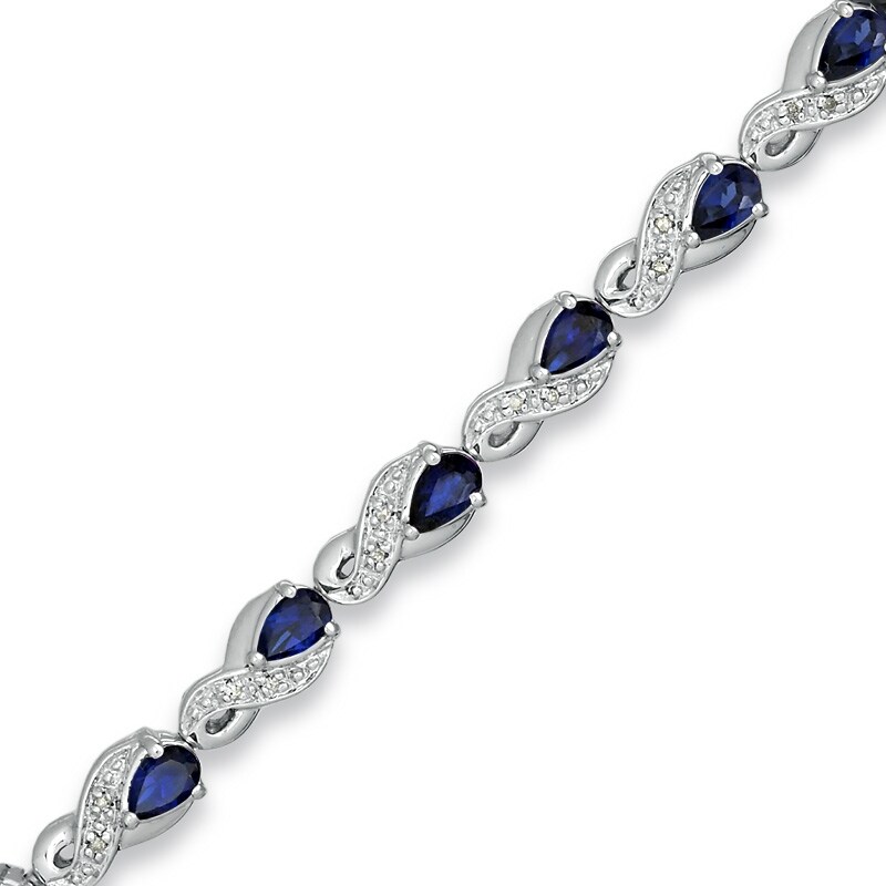 Previously Owned - Pear-Shaped Lab-Created Blue Sapphire and 1/10 CT. T.W. Diamond Bracelet in Sterling Silver