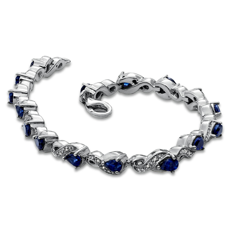 Thumbnail Image 1 of Previously Owned - Pear-Shaped Lab-Created Blue Sapphire and 1/10 CT. T.W. Diamond Bracelet in Sterling Silver