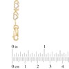 Thumbnail Image 2 of Previously Owned - Alternating "X" and Heart Bracelet in 10K Two-Tone Gold - 7.25"