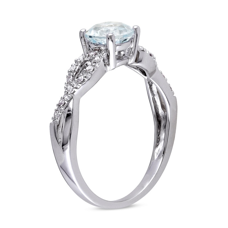 Previously Owned - 6.0mm Aquamarine and Diamond Accent Twist Shank Ring in 10K White Gold