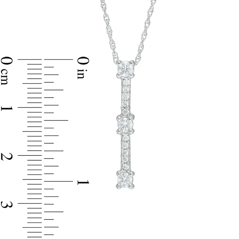 Previously Owned - 1/2 CT. T.W. Diamond Vertical Three Stone Pendant in 10K White Gold