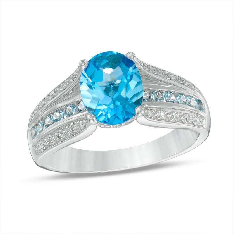 Main Image 1 of Previously Owned - Oval Swiss Blue Topaz and 1/10 CT. T.W. Diamond Triple Row Cathedral Ring in 10K White Gold