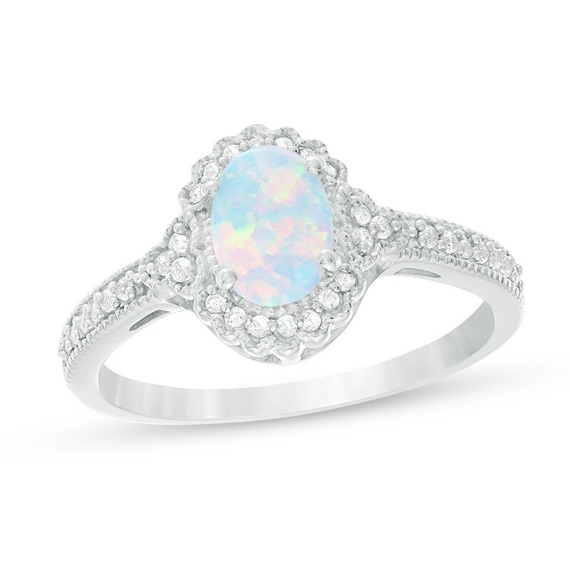 Main Image 1 of Previously Owned - Oval Lab-Created Opal and 1/8 CT. T.W. Diamond Frame Vintage-Style Ring in 10K White Gold
