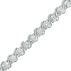 Thumbnail Image 0 of Previously Owned - 1/10 CT. T.W. Diamond "S" Tennis Bracelet in Sterling Silver - 7.25"