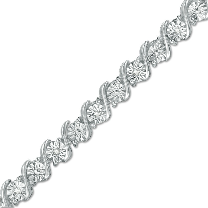Previously Owned - 1/10 CT. T.W. Diamond "S" Tennis Bracelet in Sterling Silver - 7.25"