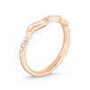 Thumbnail Image 1 of Previously Owned - 1/6 CT. T.W. Baguette and Round Diamond Wave Wedding Band in 10K Rose Gold