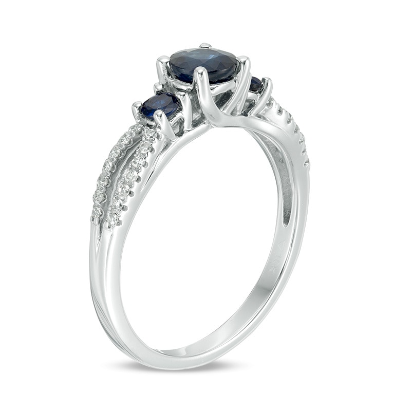 Main Image 2 of Previously Owned - Blue Sapphire and 1/8 CT. T.W. Diamond Three Stone Split Shank Ring in 10K White Gold