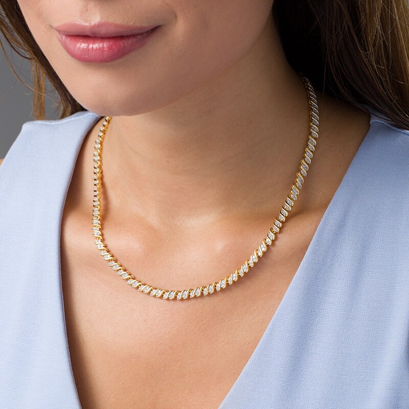 Previously Owned - 2 CT. T.W. Diamond Two-Stone Curve Tennis Necklace in Sterling Silver with Yellow Rhodium - 17"