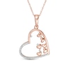 Thumbnail Image 1 of Previously Owned - 1/10 CT. T.W. Scattered Diamond Tilted Heart Oultline Pendant in 10K Rose Gold