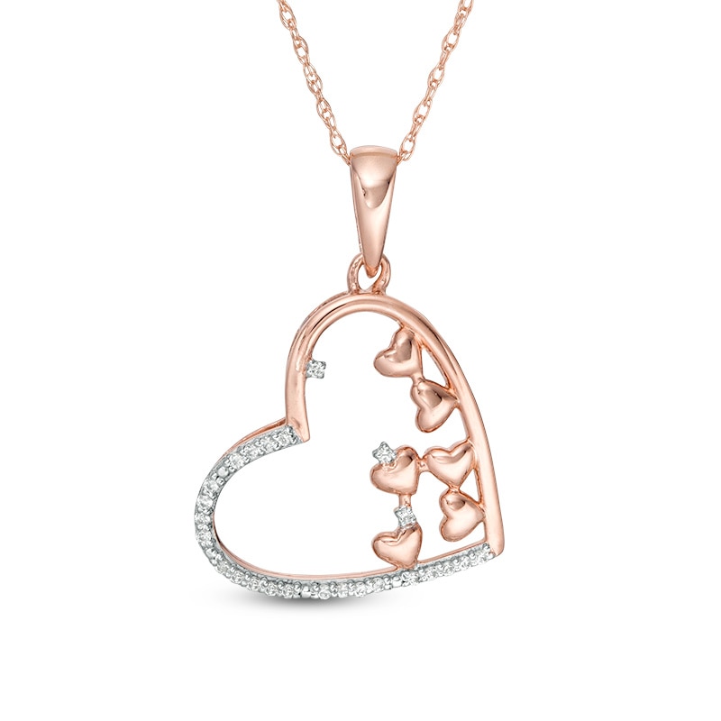 Main Image 1 of Previously Owned - 1/10 CT. T.W. Scattered Diamond Tilted Heart Oultline Pendant in 10K Rose Gold