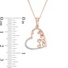 Thumbnail Image 2 of Previously Owned - 1/10 CT. T.W. Scattered Diamond Tilted Heart Oultline Pendant in 10K Rose Gold