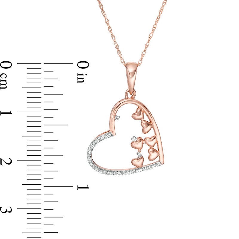 Main Image 2 of Previously Owned - 1/10 CT. T.W. Scattered Diamond Tilted Heart Oultline Pendant in 10K Rose Gold