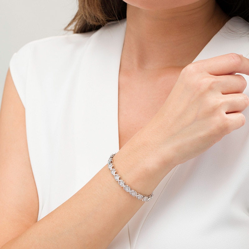 Main Image 2 of Previously Owned - 1/10 CT. T.W. Diamond "XO" Bracelet in Sterling Silver - 7.25"