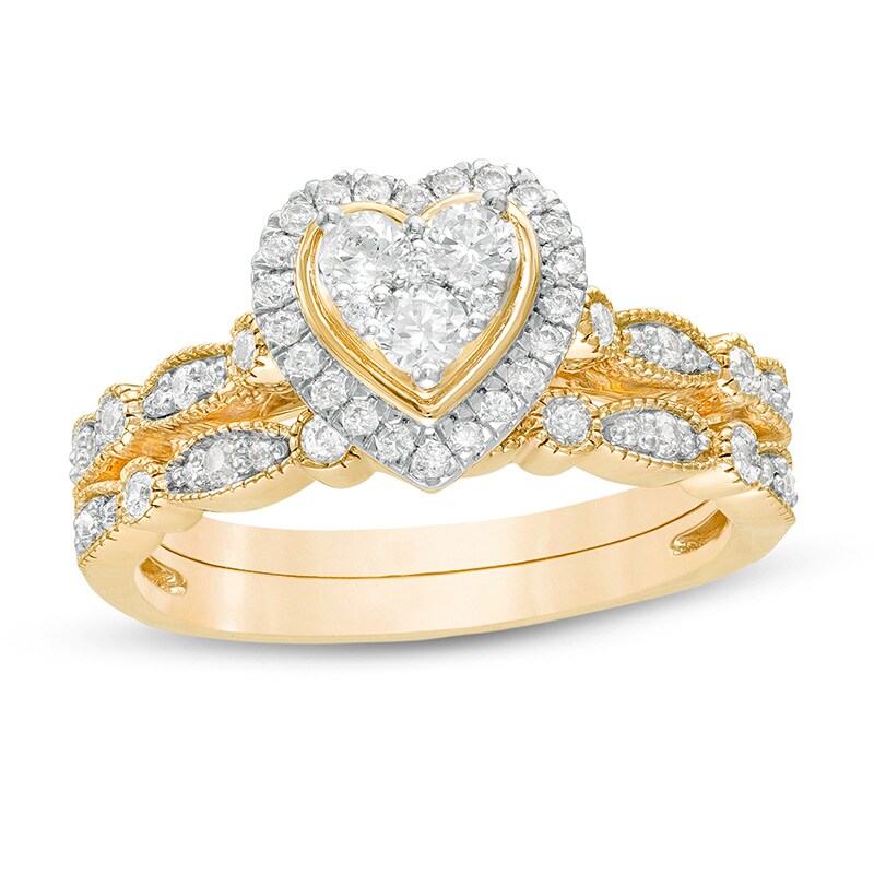 Previously Owned - 1/2 CT. T.W. Multi-Diamond Heart Frame Alternating Marquise Vintage-Style Bridal Set in 10K Gold