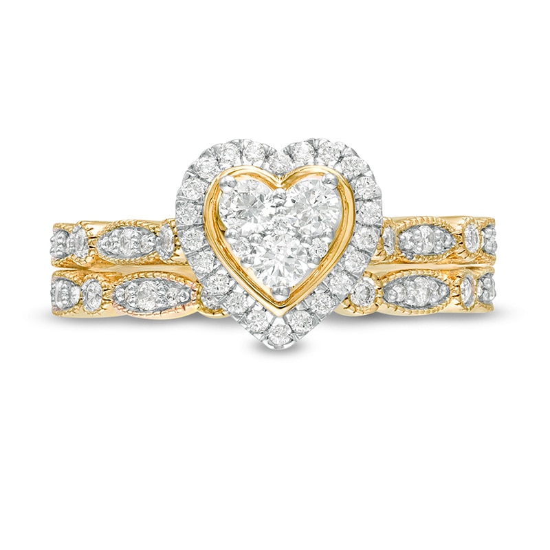 Previously Owned - 1/2 CT. T.W. Multi-Diamond Heart Frame Alternating Marquise Vintage-Style Bridal Set in 10K Gold