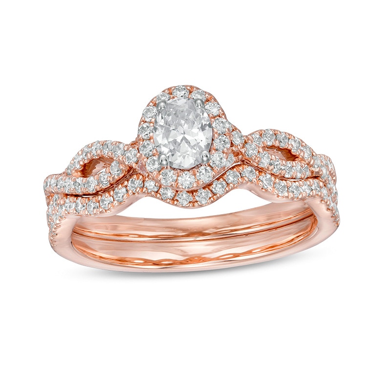 Main Image 1 of Previously Owned - 1 CT. T.W. Oval Diamond Frame Split Shank Bridal Set in 14K Rose Gold