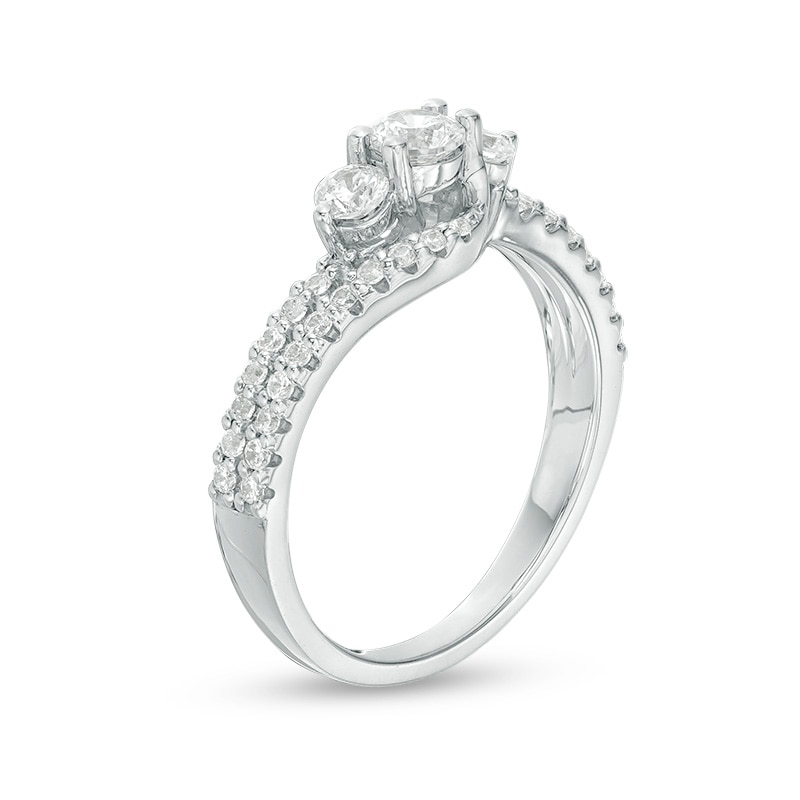 Previously Owned - 3/4 CT. T.W. Diamond Three Stone Double Row Bypass Engagement Ring in 14K White Gold