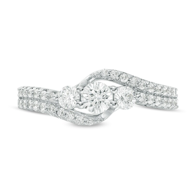 Previously Owned - 3/4 CT. T.W. Diamond Three Stone Double Row Bypass Engagement Ring in 14K White Gold